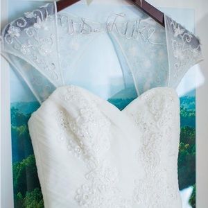 Pristine wedding dress by Blue, in ivory